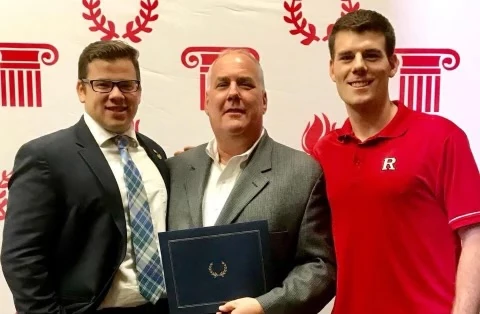 Keith Brauer receiving the Rutgers Fraternity Advisor of the Year award in 2018